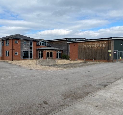 AWS secure industrial/office complex purchase in Dunnington